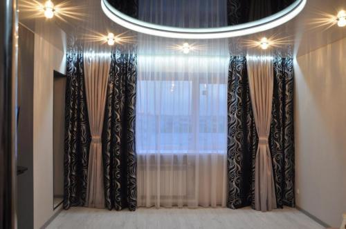 Выбор штор под стиль гостиной. Как выбрать шторы в гостиную: фото, советы дизайнеров 11 Выбор штор под стиль гостиной. Как выбрать шторы в гостиную: фото, советы дизайнеров 11