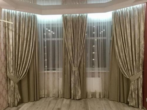 Выбор штор под стиль гостиной. Как выбрать шторы в гостиную: фото, советы дизайнеров 07 Выбор штор под стиль гостиной. Как выбрать шторы в гостиную: фото, советы дизайнеров 07