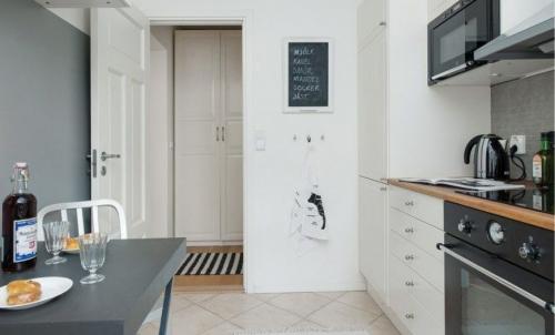 Дизайн угловой кухни с холодильником. Дизайн угловых кухонь разной площади с холодильником 01